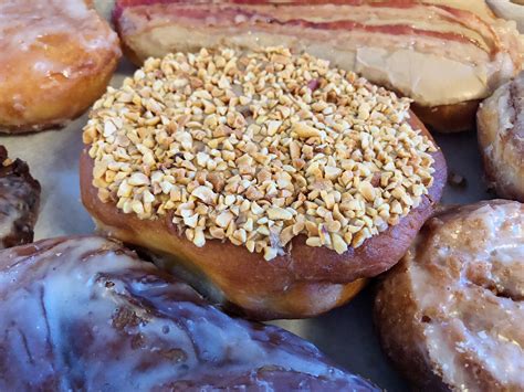 Joes donuts - Glazed Flavored Cakes. Applesauce, Blueberry (Also known to make special appearances) Red Velvet, Pumpkin Rum, Almond poppy seed, Tea infused, Banana. $0.95.